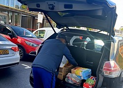Our inaugural food bank donation collected in August being delivered to YMCA building West Bromwich.